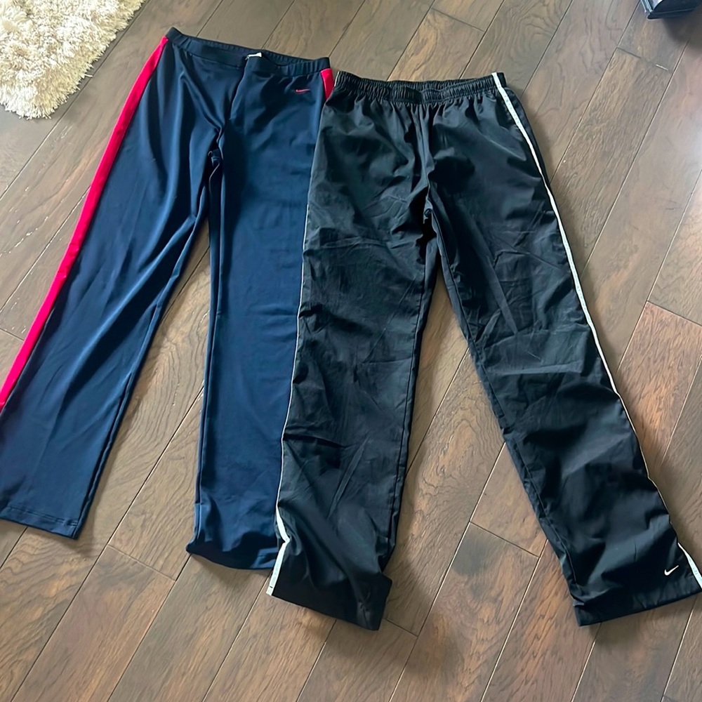 2 Nike warm-up/workout pants. Price is for both.